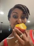 Me eating a peach