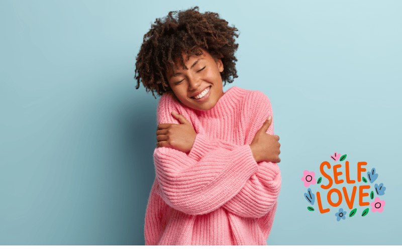 Woman hugging herself for self-love Woman hugging herself for self-love